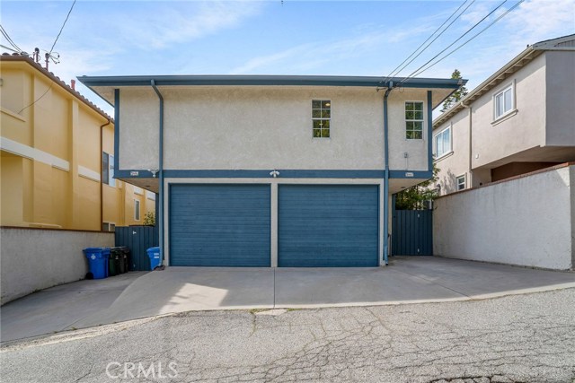 BACK HOUSE: OFF PROSPECT PL.  TOTAL OF 2-ONE GARAGES. 4 DRIVEWAY PARKING SPACES.  GIVING YOU A TOTAL OF 6 PARKING SPACES.