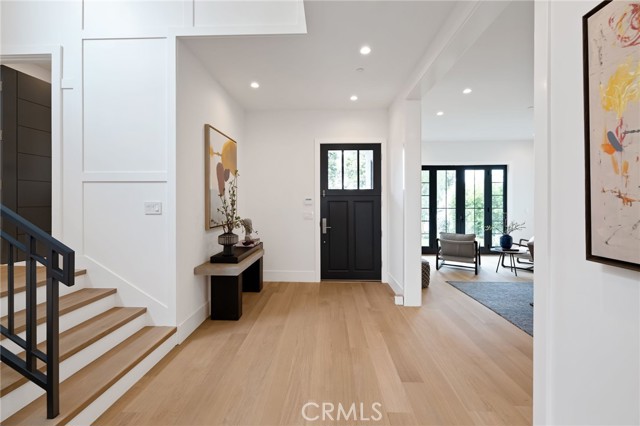 Spacious foyer opens into dining area
