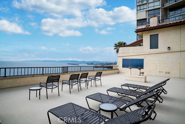 Very large community patio overlooking panoramic ocean views.