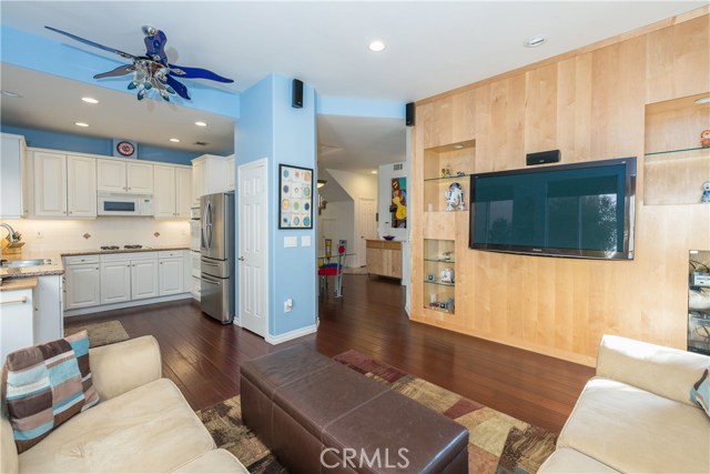 Kitchen w/ Recessed Lights & Under Counter Lighting; Family Room w/ Custom Built-Ins, Surround Sound Speakers...