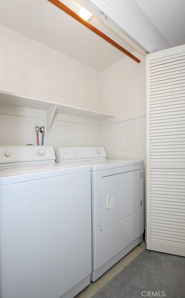 Laundry in Hallway of Unit