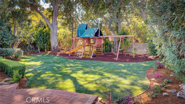 Kids, pets and adults will enjoy the spacious and private backyard.