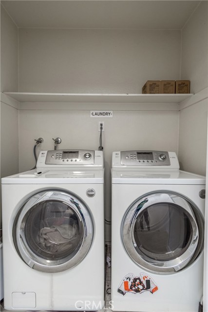 Laundry upstairs between the two dual master suites.