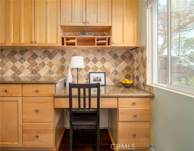 Dedicated office space with built in desk and tremendous storage in drawers and cabinets!
