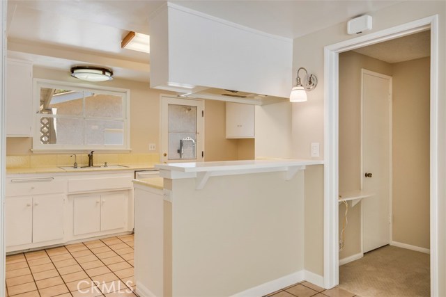 Freshly painted cabinets give you a headstart for taking the next step in modernizing the kitchen