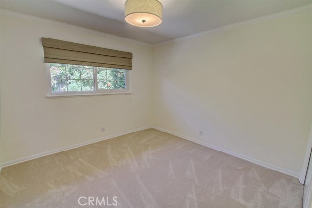 Bedroom 3 with view of rear yard