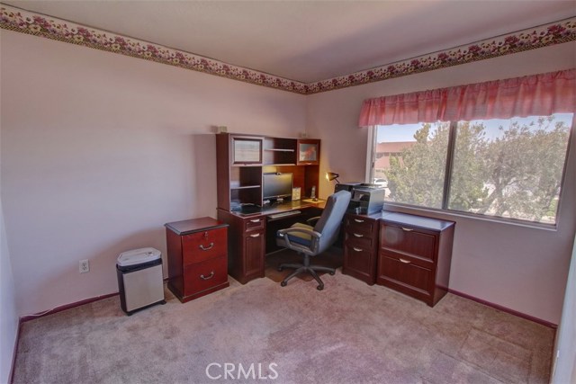 One of the 3 bedrooms used as an office