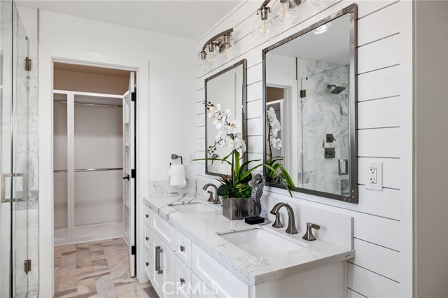 Dual vanities with coastal design elements