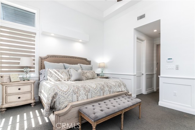 Vaulted ceilings add to the open feeling of this master suite