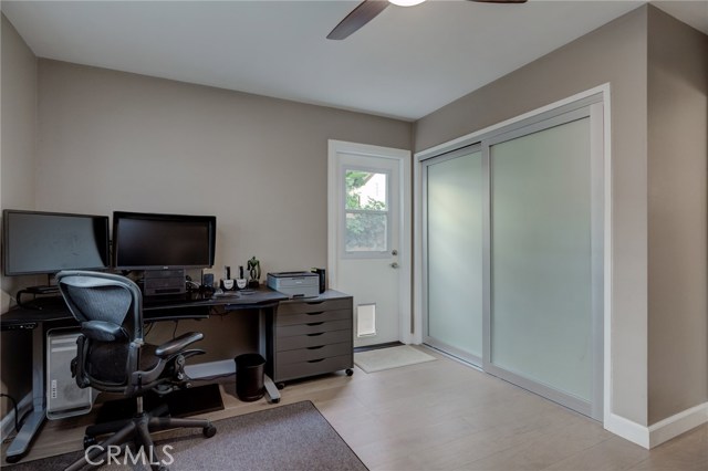 Bedroom/office. Door to back yard. Doggie door.