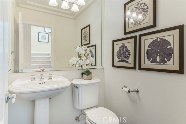 Powder room on second level which services guests in the living spaces