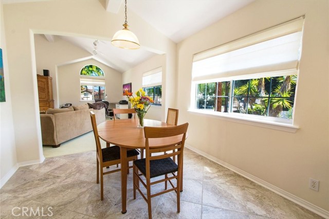 Dining area situated next to kitchen and flows to livingroom