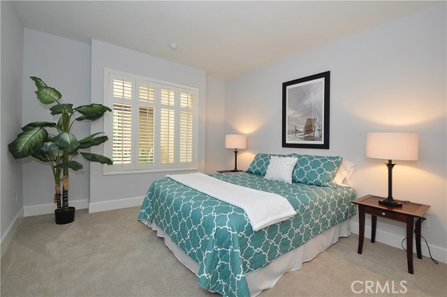 Guest Bedroom - White Plantation Shutters