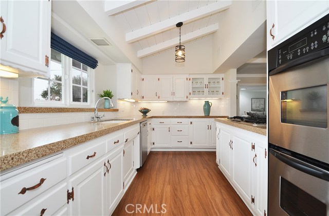 Kitchen with stainless steel appliances and granite counters and lots of storage