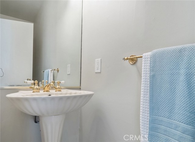 Guest Bathroom between Foyer / Sunroom and Living Room