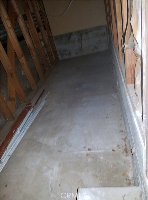 Extra storage area behind garage -