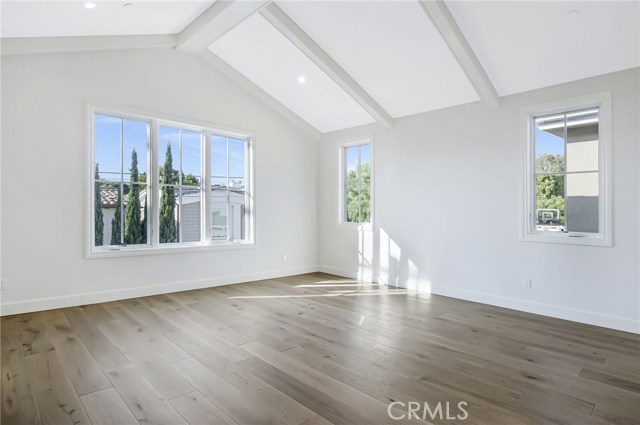 Beautiful master bedroom with vaulted ceilings and bright light.