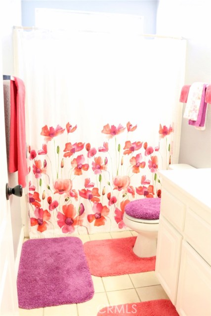 Bathroom 3.  Bathroom is located directly down the hallway in between the pink and yellow bedrooms.