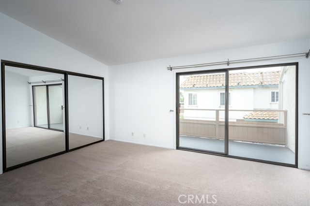 North side Master Bedroom with sliding door to upper deck.