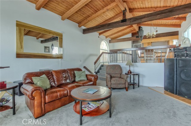 Living room with beamed ceiling