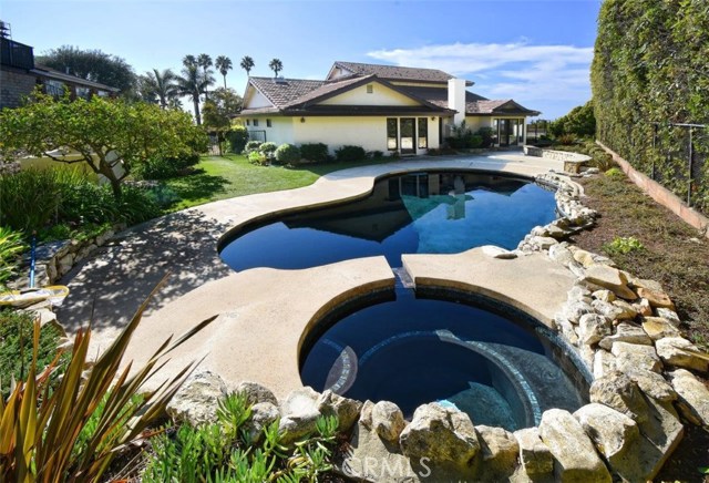 Black bottom heated pool and jacuzzi.