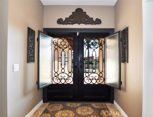 Fabulous front doors with glass panels that open for ventilation