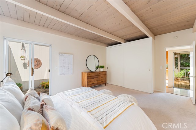 Master bedroom with view of bedroom atrium