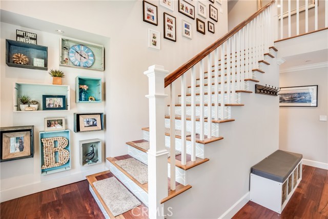 Inlaid walnut staircase to 2nd level