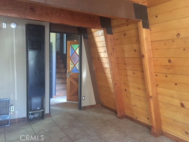 Downstairs entry and eating area located near kitchen