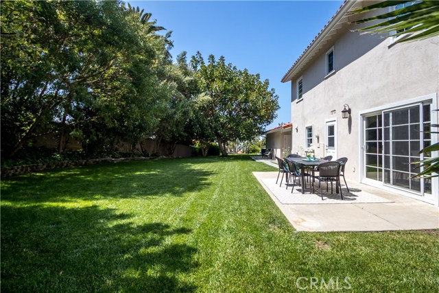 Multiple patio areas for al fresco dining and plenty of room to play!