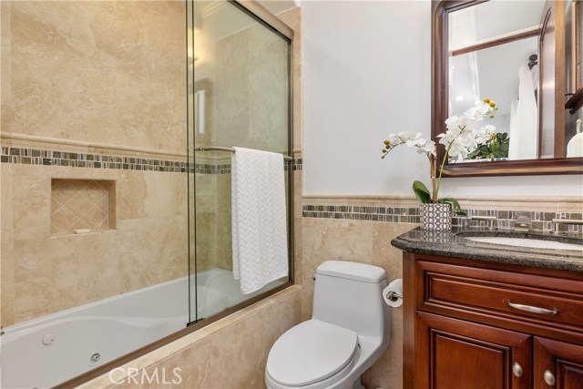 Full Bathroom with main floor bedroom (currently staged as an office)