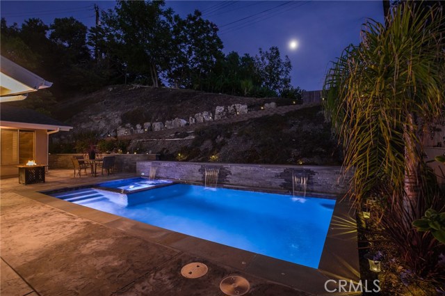 LED lights and waterfall treatment invite you for a night swim