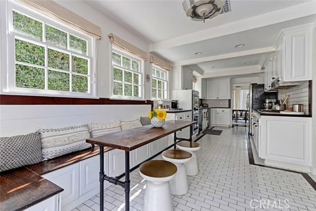 Built in Breakfast Nook and Antique Fixtures in Keeping with the Classic Style of the House.