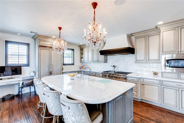 Fully equipped, this kitchen has a full appliance suite, desk area and pantry