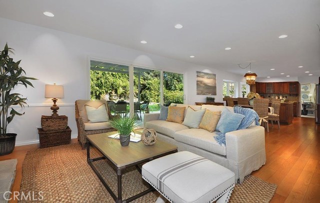 Family Room off Kitchen with Sliding Glass Door to the Private Backyard.