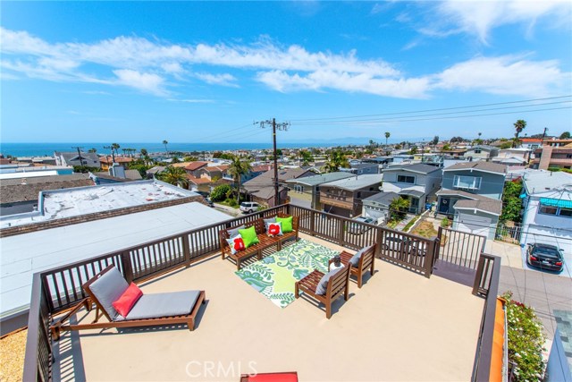 One of the few homes with a roof top deck on the block