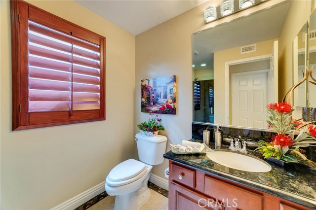 Downstairs 3/4 bathroom with granite walk-in shower