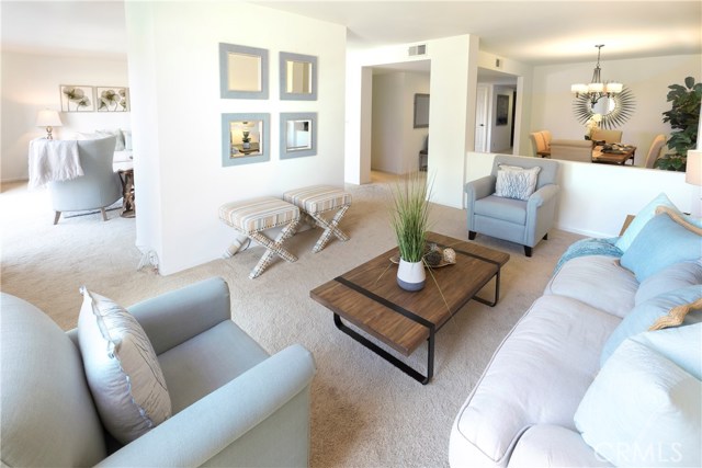 Another view of the Family Room looking into the Living Room to the left and Dining Room to the right.