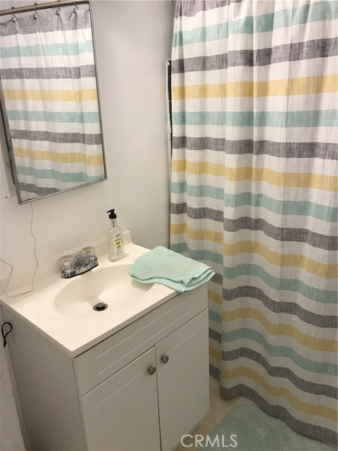 downstairs bath with tub/shower- older tile walls