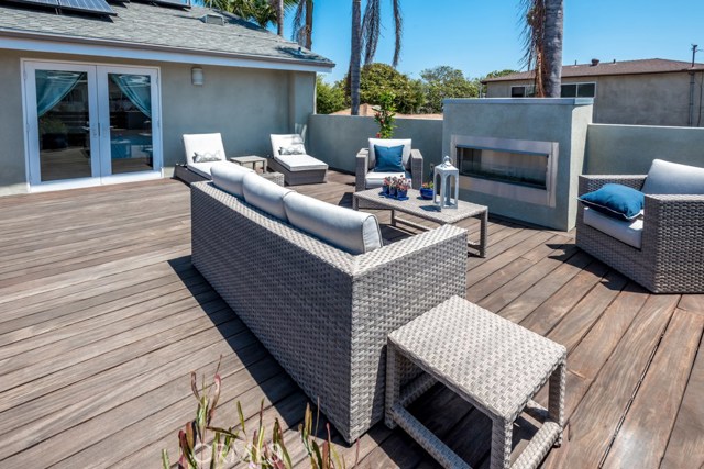 Deck with fireplace off Master Bedroom