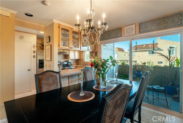 Dining Room with sliders to balcony.