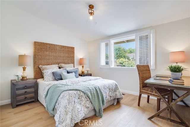 One of three lovely bedrooms. This one looks out onto the front porch.