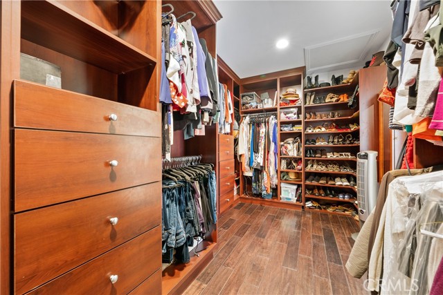 Huge walk-in closet with built-ins.