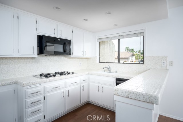Kitchen.  Lighting and hardware are new.