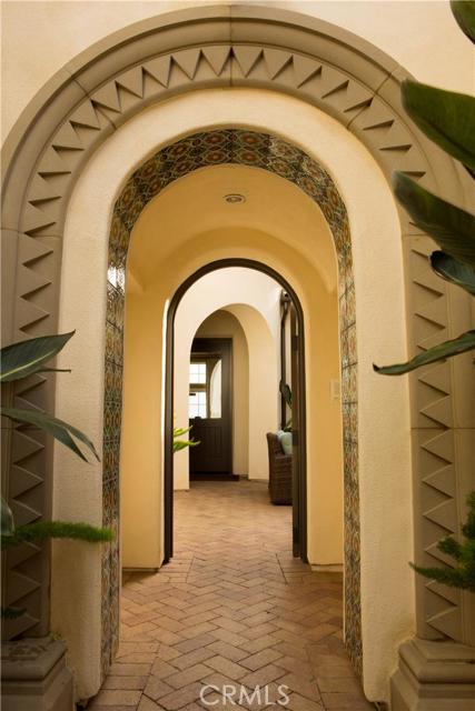 Enter through artful arches to your private, gated courtyard.