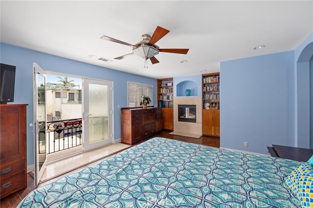 Master Suite with balcony and fireplace