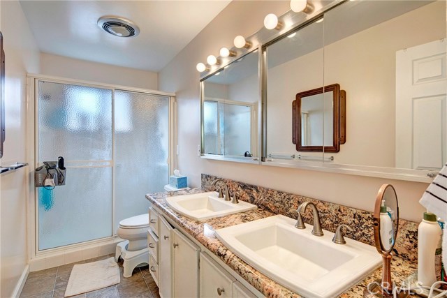 Updated with granite countertops, dual sinks, and walk in shower.