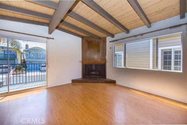 Second floor living area with fireplace