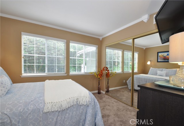 Downstairs Bedroom # 1 has Sliding Mirror Closet Doors and 2 Side by Side Dual Pane Windows