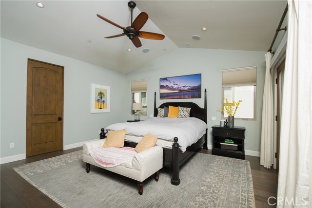 Beautiful Master Suite has wide plank wood flooring, tall ceilings, and Juliet balcony!